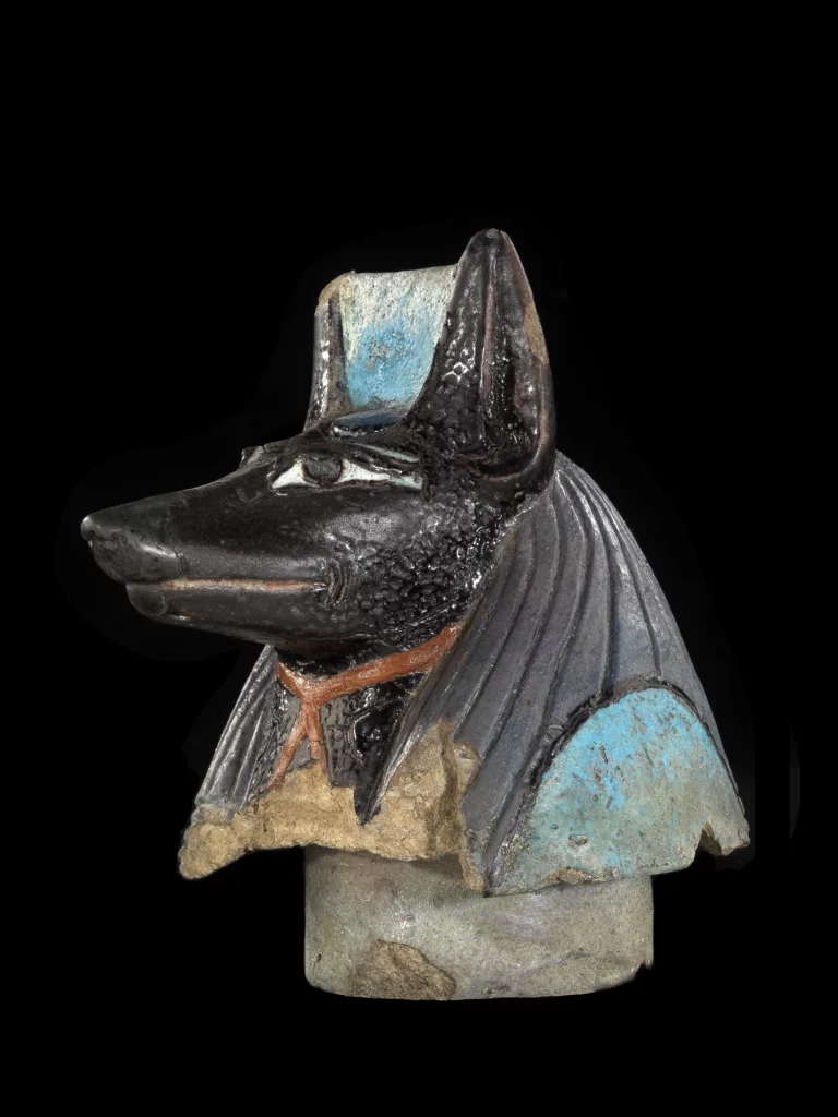 Canopic jar stopper in the form of a dog’s head, funerary object from ancient Egypt, Louvre Museum, Paris, collection E 10837.
