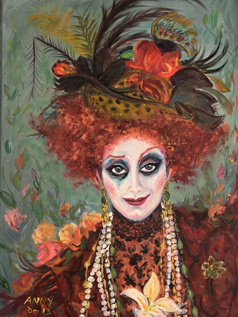 Anny Duperey – La Folle de Chaillot, portrait d'une femme au regard intense et au chapeau fleuri, peinture figurative aux couleurs éclatantes.